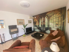 Haut de villa avec terrasse privative jardin et parking tout près des plages